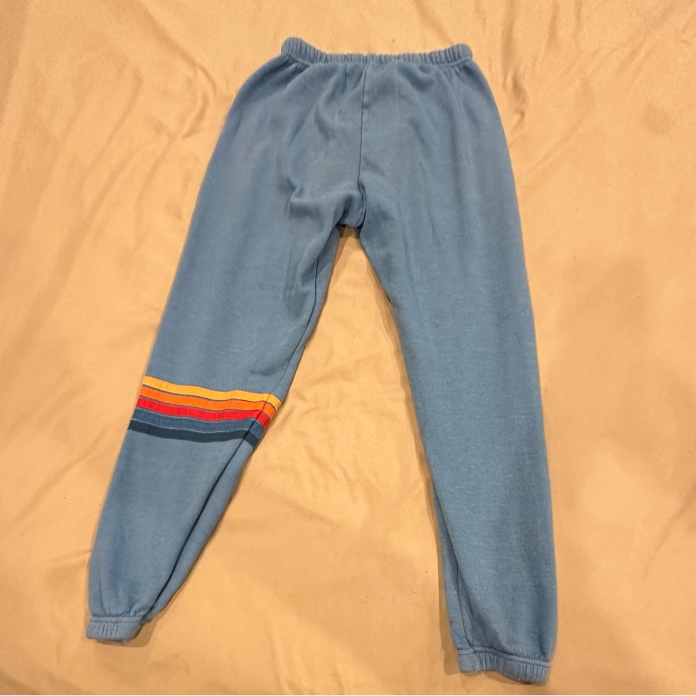 Aviator Nation Blue Track Pants with Rainbow Stripe